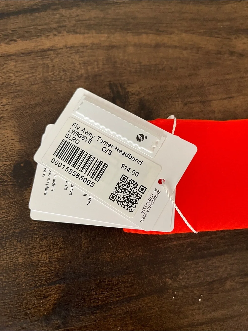 Lululemon Fly Away Tamer Headband in Solar Orange